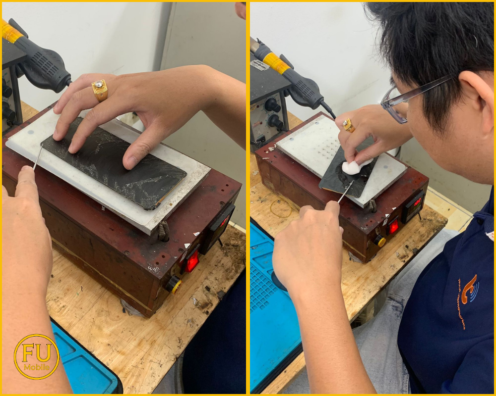 Kỹ thuật viên FUmobile đang tỉ mỉ thao tác trên máy ép kính với trang thiết bị hiện đại